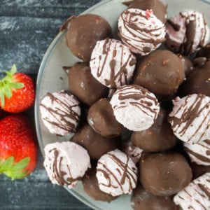 Keto Chocolate Covered Strawberry Fat Bombs are the perfect sweet to treat yourself with this Valentine's Day! With only 0.8 net carbs per ball, you will be hooked!