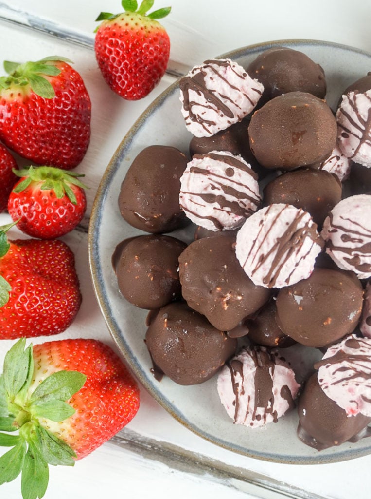 Keto Chocolate Covered Strawberry Fat Bombs are the perfect sweet to treat yourself with this Valentine's Day! With only 0.8 net carbs per ball, you will be hooked!