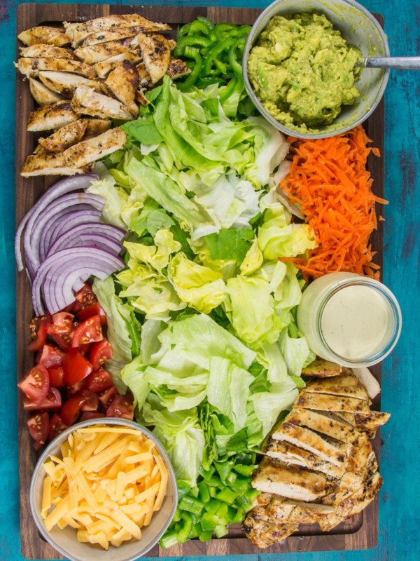 This Chicken Taco Salad Board is put together with fresh ingredients for everyone to enjoy! Bring everyone together this Taco Tuesday with a beautiful entertaining board.