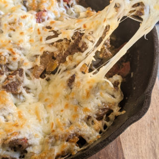 One Pan Keto Philly Cheesesteak Recipe is under 4 net carbs and ready in 30 minutes! This family-friendly meal is a keto diet staple.