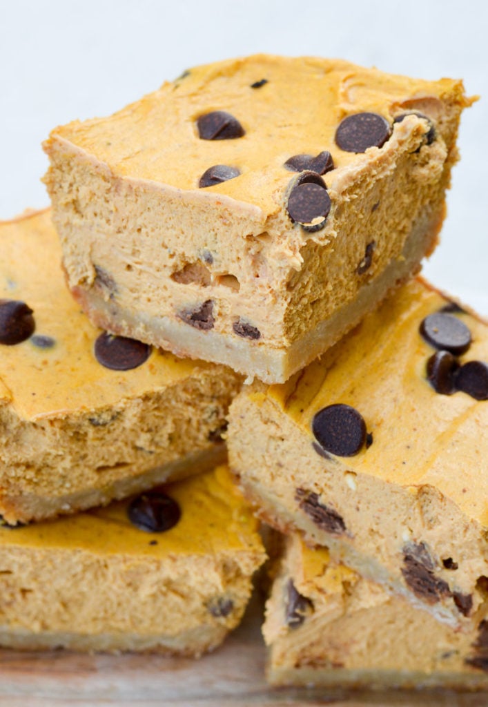 These Keto Pumpkin Chocolate Chip Cheesecake Bars are super creamy, full of pumpkin flavor and only have 5 net carbs! Try this low-carb fall dessert today. 