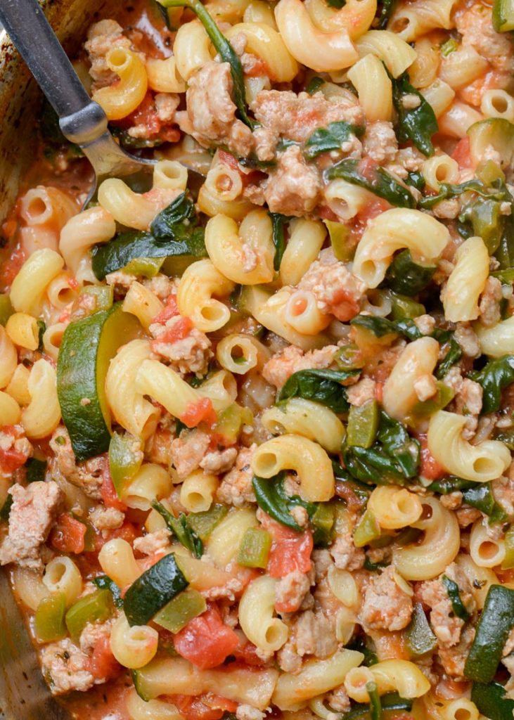 This easy and cheesy pasta recipe is a family-friendly one-pot dinner favorite. It is packed with vegetables and comes together in just 30 minutes!