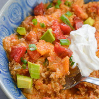 This low carb Keto Taco Casserole is loaded with seasoned ground beef, vegetables and loads of cheese!
