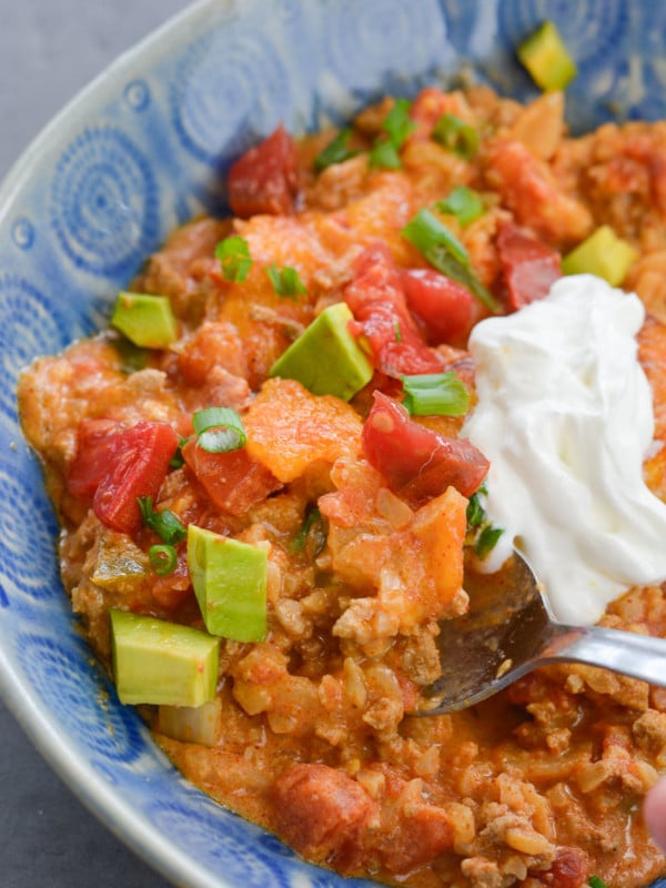 This low carb Keto Taco Casserole is loaded with seasoned ground beef, vegetables and loads of cheese!
