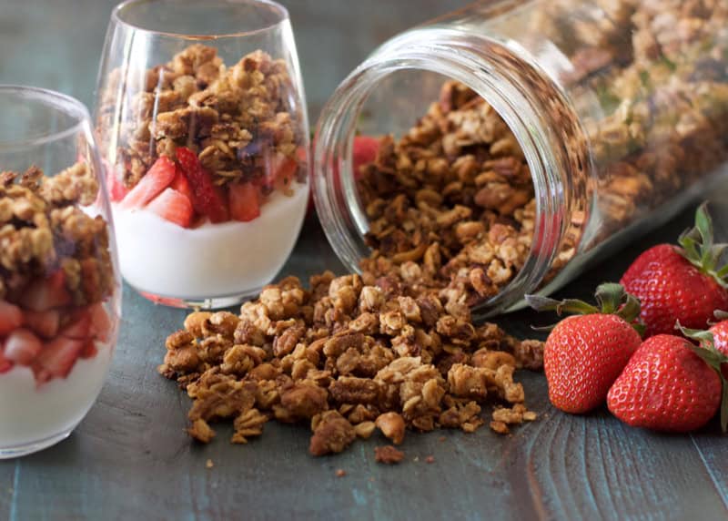 This Homemade Peanut Butter Granola is loaded with healthy ingredients, and comes together in just a few minutes! You can use this granola for healthy fruit parfaits, smoothie bowls, or a crunchy snack!