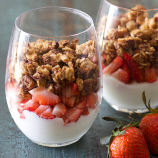 This Homemade Peanut Butter Granola is loaded with healthy ingredients, and comes together in just a few minutes! You can use this granola for healthy fruit parfaits, smoothie bowls, or a crunchy snack!