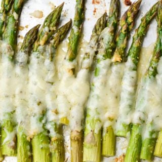 This low carb, keto-friendly Cheesy Roasted Asparagus is the perfect side dish! Prepare this easy recipe with just five basic ingredients!