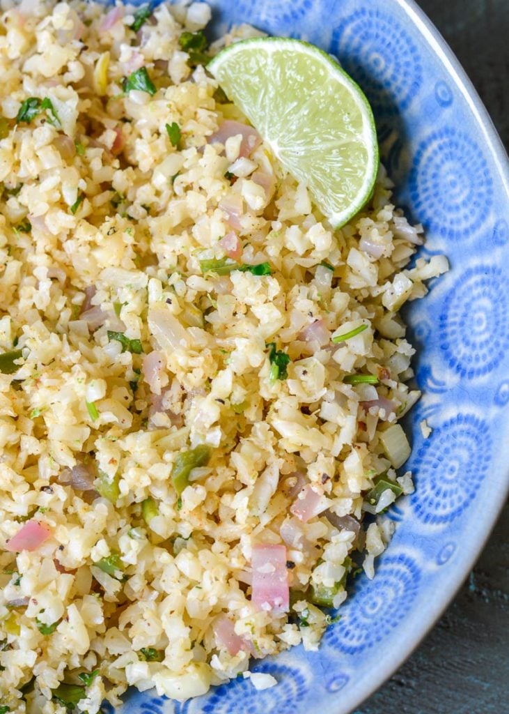 This one pan, keto-friendly Cilantro Lime Cauliflower Rice is loaded with flavor! This is the perfect low carb rice substitute! 
