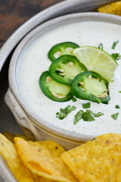 Chuy's Jalapeño Ranch dip is an all time favorite! This easy copycat recipe features fresh jalapeños, cilantro, and a bit of lime, it is great on tacos, salads or with crunchy tortilla chips!