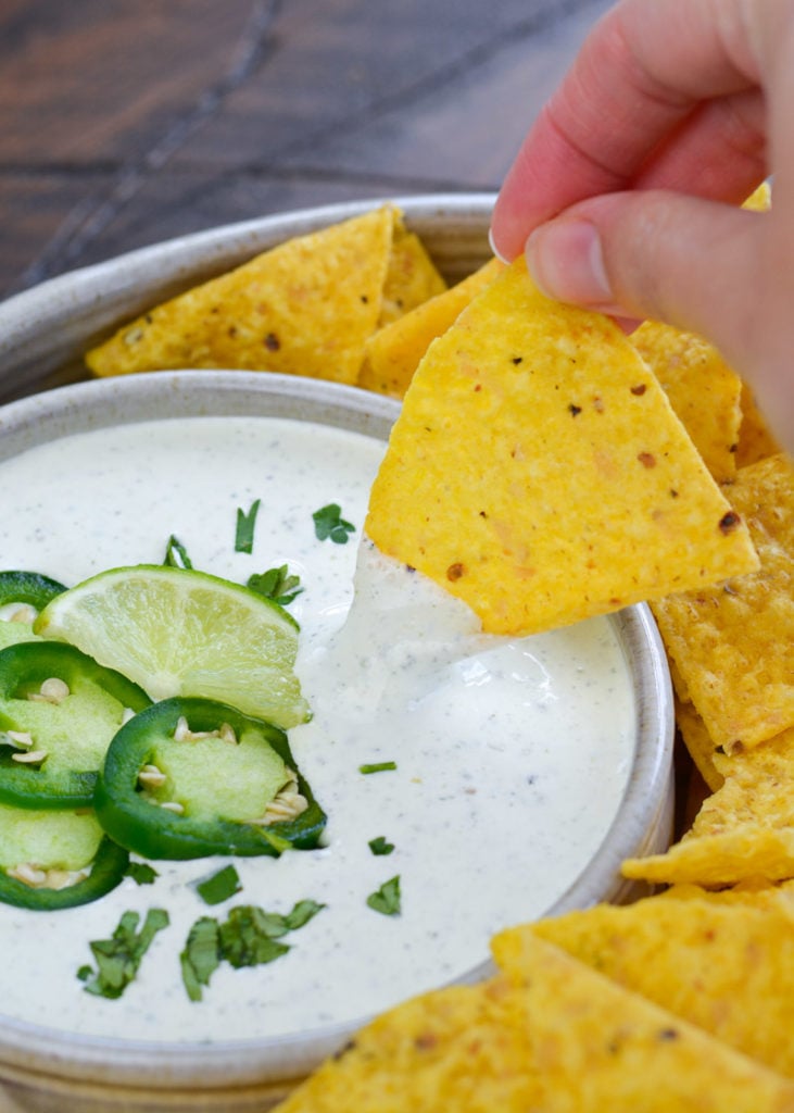 Chuy's Jalapeño Ranch dip is an all time favorite! This easy copycat recipe features fresh jalapeños, cilantro, and a bit of lime, it is great on tacos, salads or with crunchy tortilla chips! 