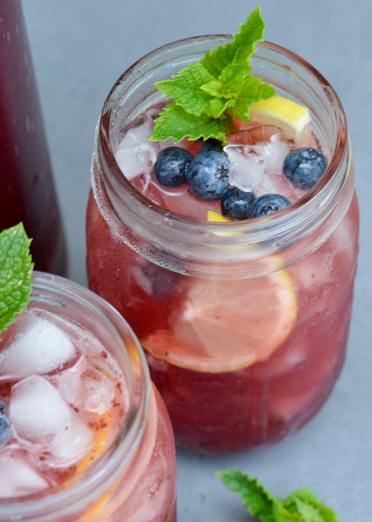This refreshing Spiked Blueberry Lemonade recipe is perfect for your summer parties! You only need 5 ingredients and 20 minutes for this adults-only treat!