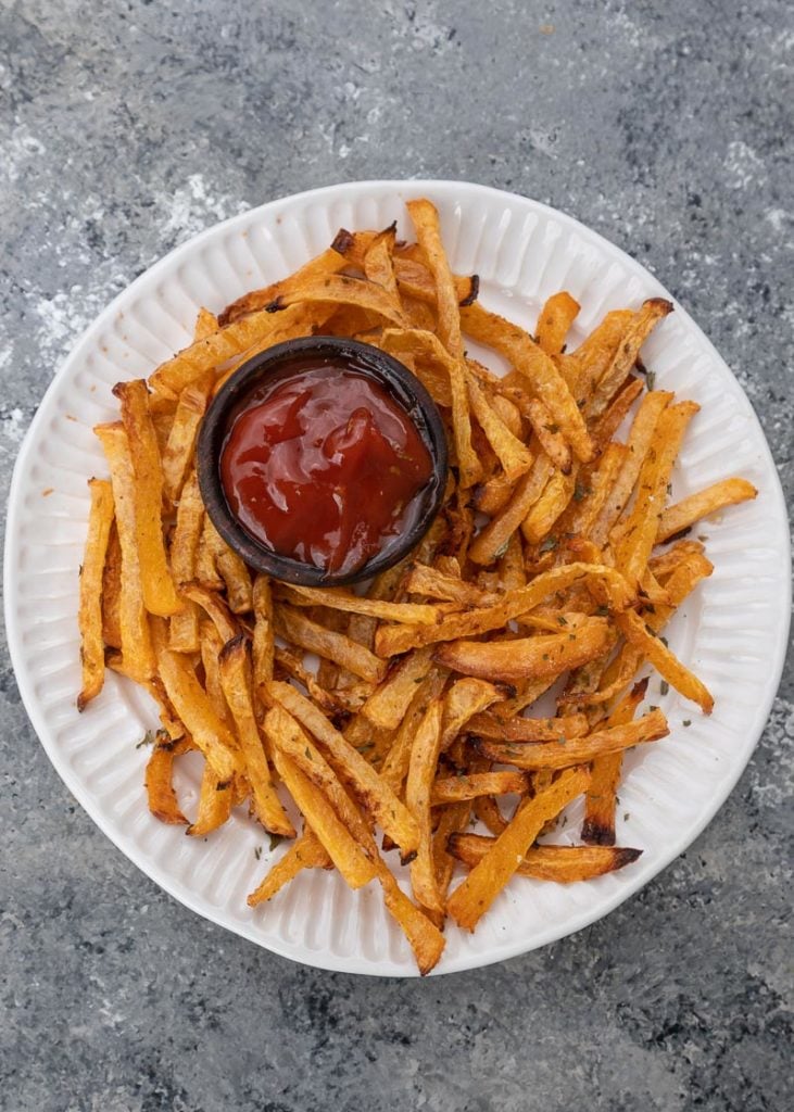 These easy three ingredient Keto Fries are crispy, salty and so satisfying! Enjoy a generous serving for about 6 net carbs! 