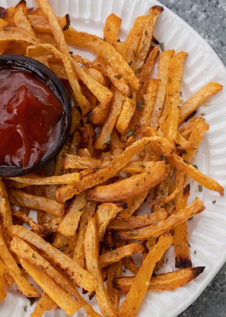 These easy three ingredient Keto Fries are crispy, salty and so satisfying! Enjoy a generous serving for about 6 net carbs! 