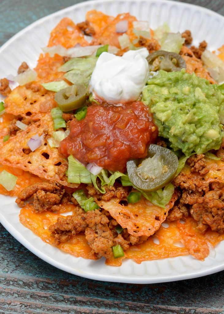 These crispy, cheesy Easy Keto Nachos are ready in about 10 minutes! This is the perfect easy meal or appetizer for about 3 net carbs!