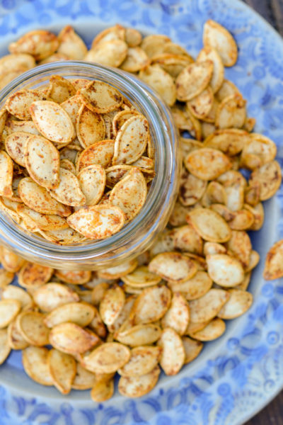 Are you wondering what to do with the seeds from your Halloween porch display? Learn how to roast pumpkin seeds for a healthy, savory snack!