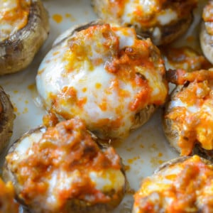 This Pizza Stuffed Mushroom Recipe features tender mushrooms loaded with Italian sausage, marinara and cheese! Each serving is a great low carb lunch under 3 net carbs!