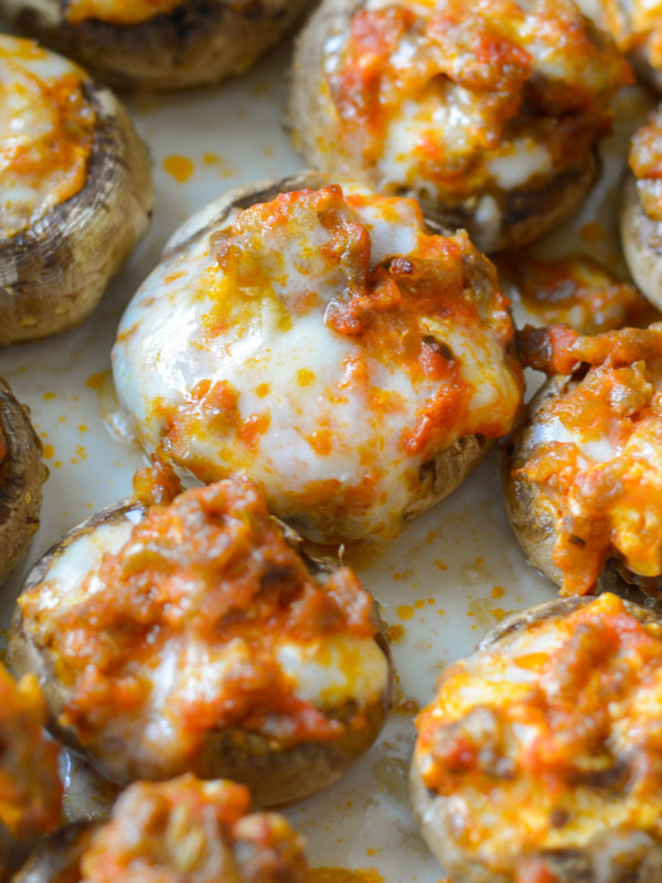 This Pizza Stuffed Mushroom Recipe features tender mushrooms loaded with Italian sausage, marinara and cheese! Each serving is a great low carb lunch under 3 net carbs!