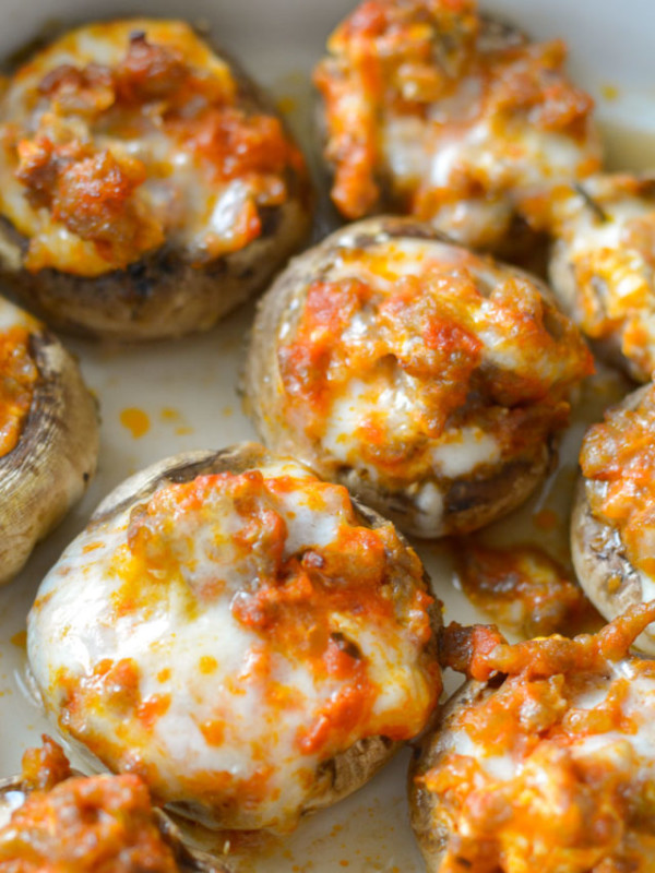 This Pizza Stuffed Mushroom Recipe features tender mushrooms loaded with Italian sausage, marinara and cheese! Each serving is a great low carb lunch under