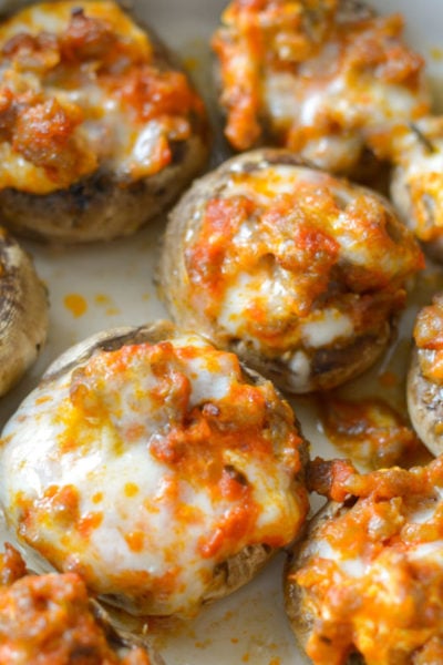 This Pizza Stuffed Mushroom Recipe features tender mushrooms loaded with Italian sausage, marinara and cheese! Each serving is a great low carb lunch under