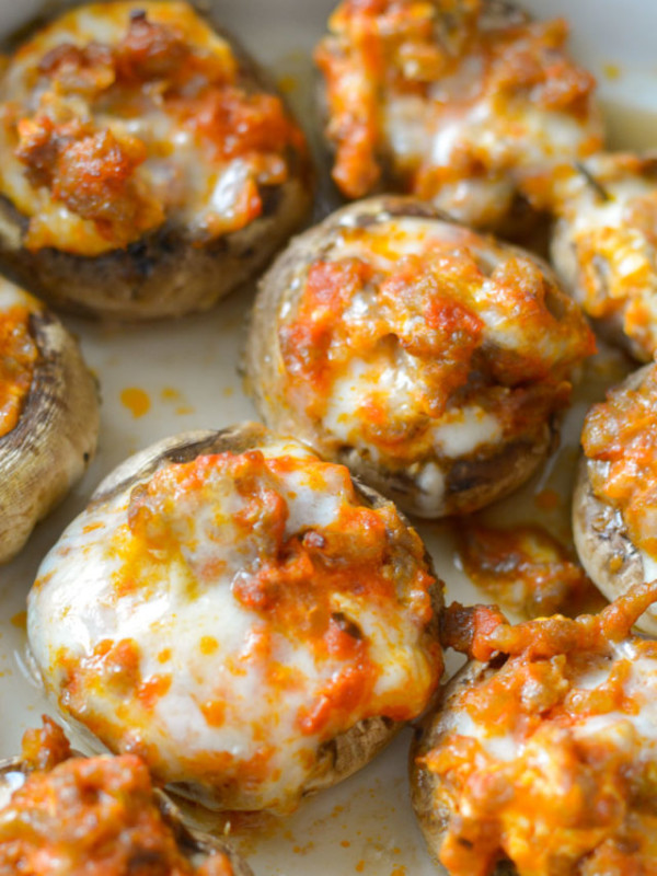 This Pizza Stuffed Mushroom Recipe features tender mushrooms loaded with Italian sausage, marinara and cheese! Each serving is a great low carb lunch under