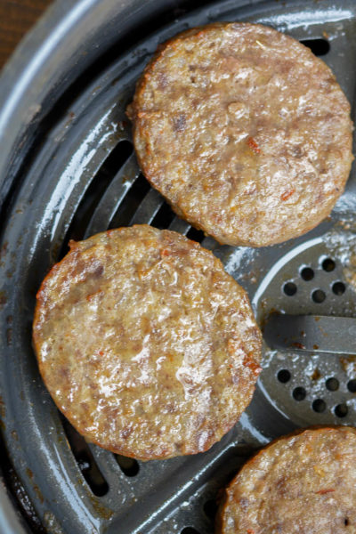 Air Fryer Sausage makes breakfast a breeze! Learn how to cook fresh or frozen sausage patties and links in the air fryer in less than 10 minutes!