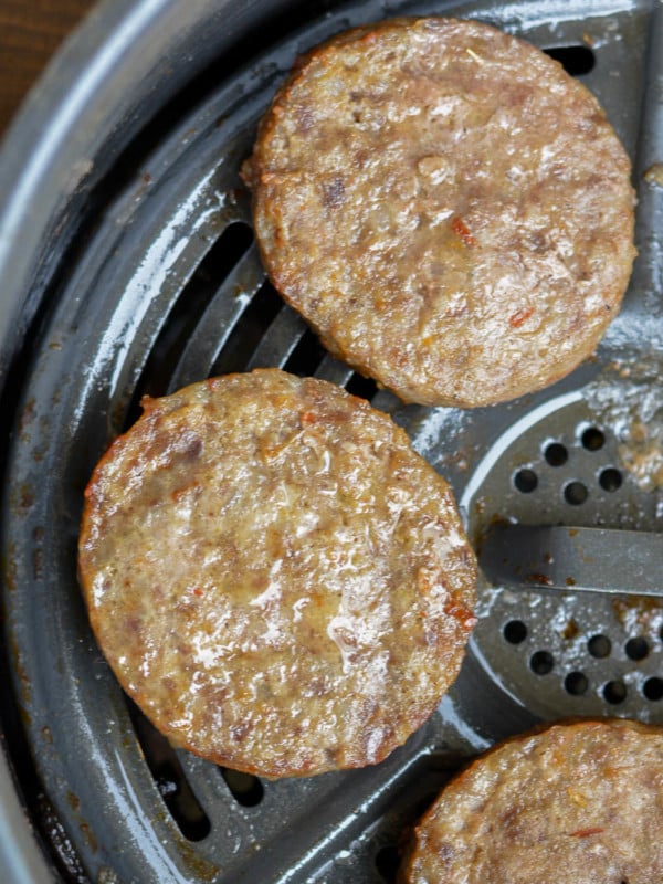 Air Fryer Sausage makes breakfast a breeze! Learn how to cook fresh or frozen sausage patties and links in the air fryer in less than 10 minutes!
