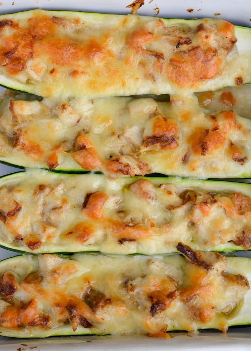 Chicken Alfredo Zucchini Boats are an easy weeknight meal! Stuffed zucchini boats filled with chicken, alfredo and cheese. This low carbohydrate, high protein meal will leave you feeling satisfied!