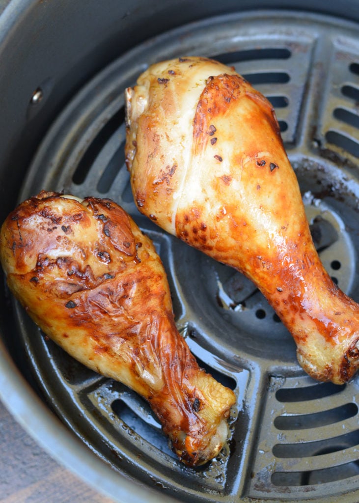 These amazing Air Fryer Chicken Legs with an easy marinade recipe require just 15 minutes of cooking for a juicy, flavorful low-carb meal!