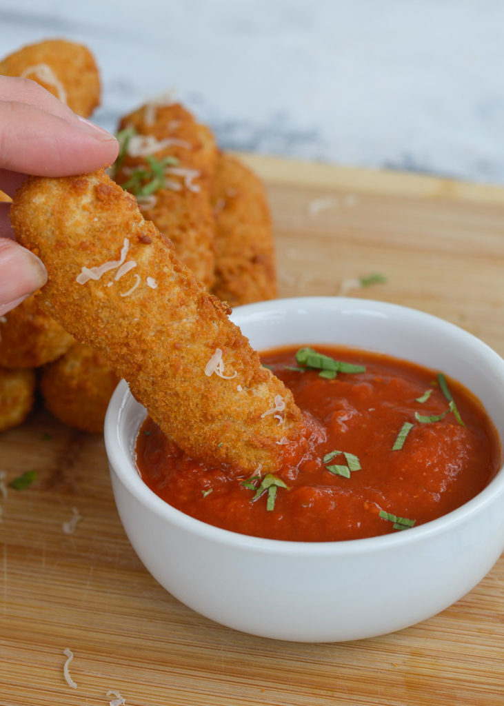 Learn how to make perfectly crisp Air Fryer Mozzarella Sticks! These instructions work for both frozen or fresh mozzarella sticks!