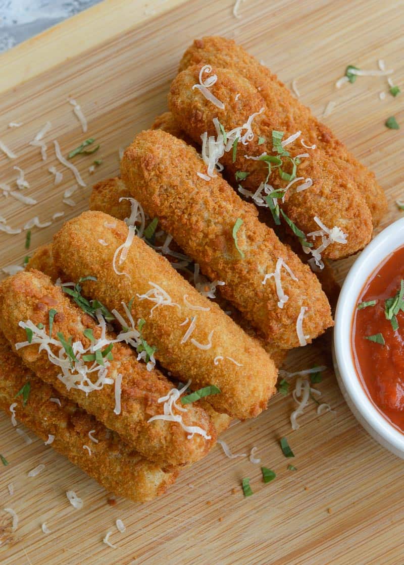 overhead view of a stack of crispy air fryer cheese sticks