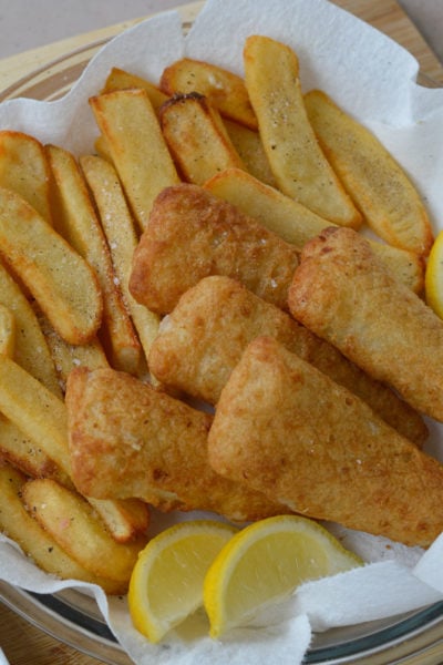 Enjoy crispy, easy Air Fryer Fish and Chips in just 15 minutes! Cooking frozen fries and frozen fish in the air fryer makes for an easy weeknight meal.