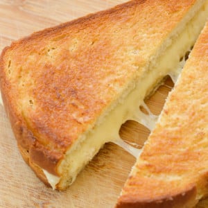 This Air Fryer Grilled Cheese makes for an easy meal in just 10 minutes! Gouda and Havarti make for a delicious, gooey sandwich with perfectly crispy sourdough bread!