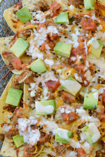 These easy Air Fryer Nachos are the best snack, ready in just 5 minutes! Customize your toppings using your favorite cheeses, leftover taco meat, bacon, and more!
