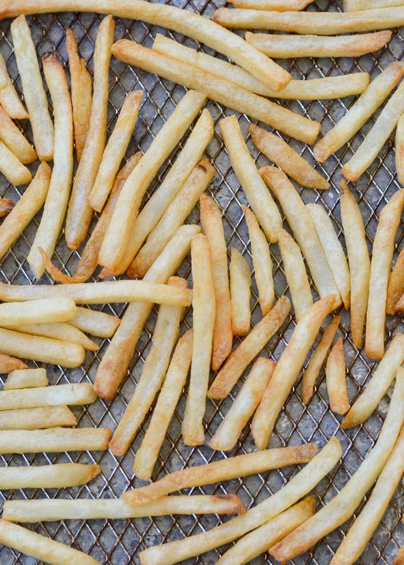 Air Fryer Fries are the crispiest, fastest way to cook everyone's favorite side dish! Find out the best cooking times so that crinkle fries, waffle fries, steak fries, sweet potato fries, or shoestring fries come out perfectly every time!