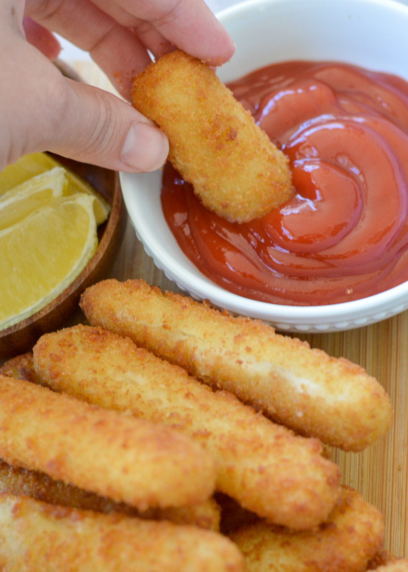 Air Fryer Fish Sticks are quick, easy, and perfectly crispy! Learn the perfect time and temperature to cook the perfect Air Fryer Frozen Fish Sticks!