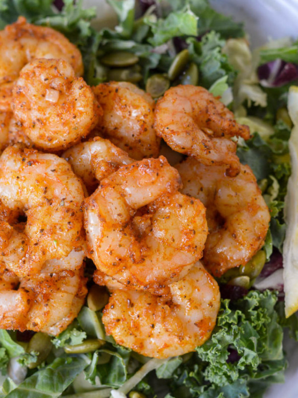 This Air Fryer Shrimp is ready in 10 minutes and great for keto meal prep! Under 1 net carb per serving, it's the perfect addition to salads, wraps, tacos, noodles, and more!