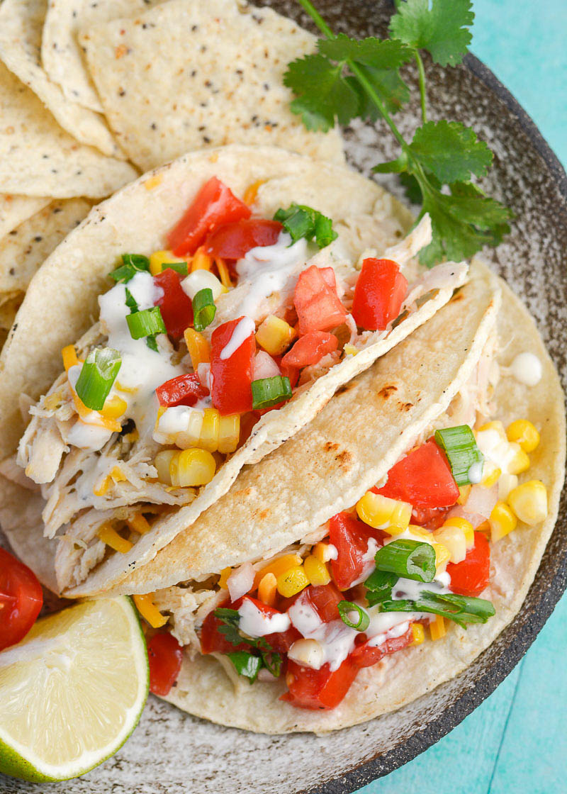 Crockpot Chicken Tacos are the perfect easy weeknight meal! This healthy dinner recipe requires just 6 basic ingredients and no prep work!