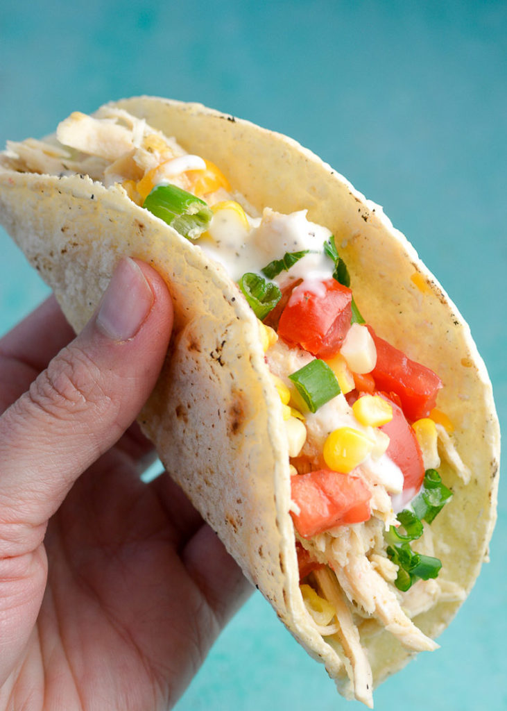 Crockpot Chicken Tacos are the perfect easy weeknight meal! This healthy dinner recipe requires just 6 basic ingredients and no prep work!