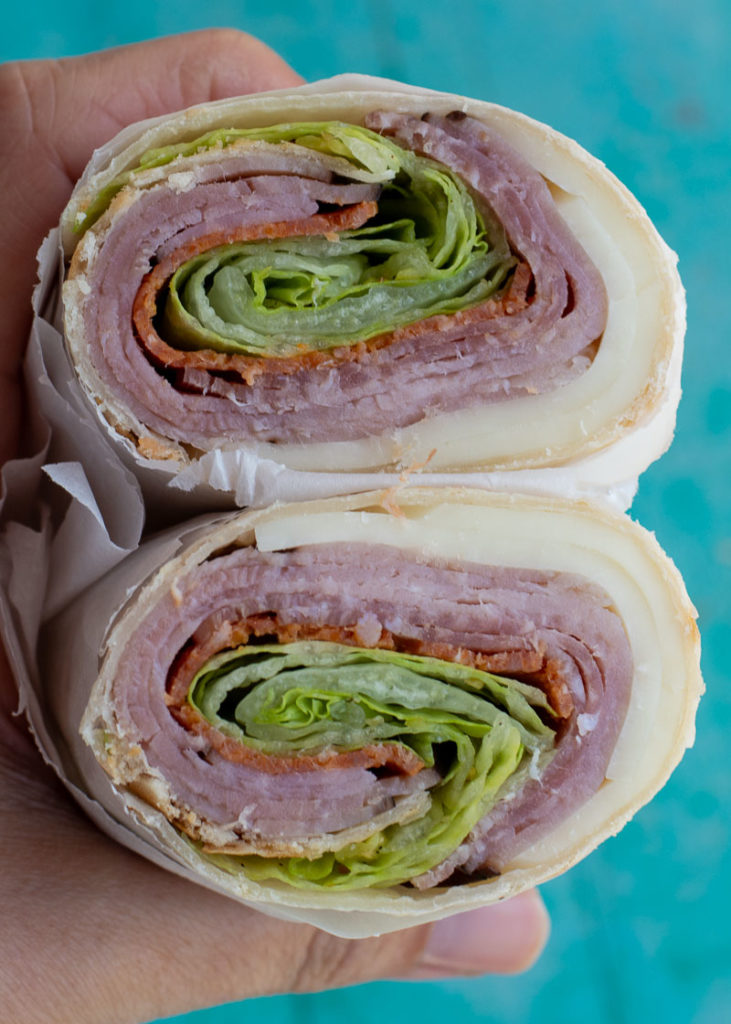 This Loaded Italian Wrap is the perfect quick no cook recipe! Ham, salami, pepperoni and provolone are all wrapped in a tortilla- this is great for keto meal prep, a light snack or a no fuss dinner!