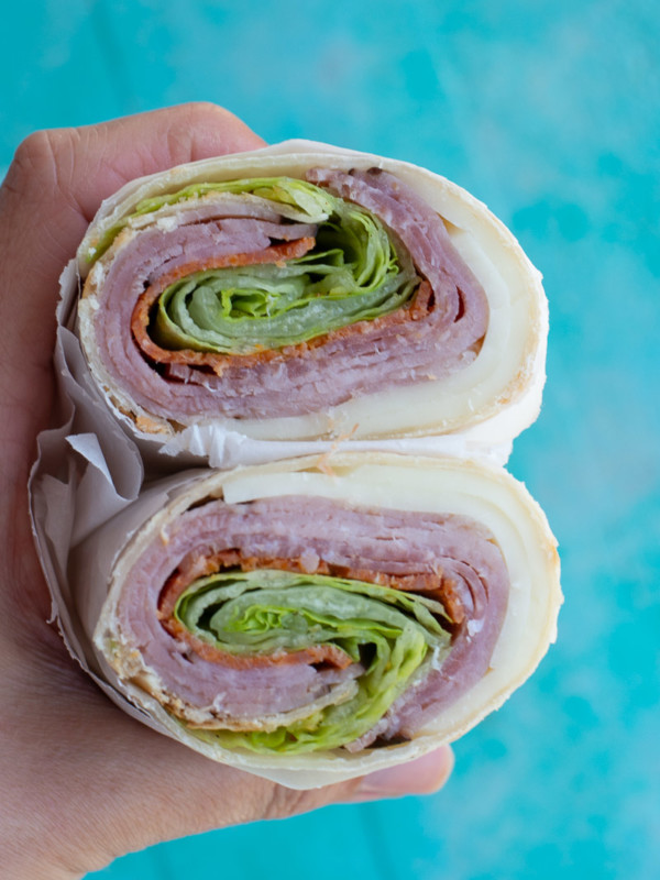 This Loaded Italian Wrap is the perfect quick no cook recipe! Ham, salami, pepperoni and provolone are all wrapped in a tortilla, making this a great recipe for keto meal prep!