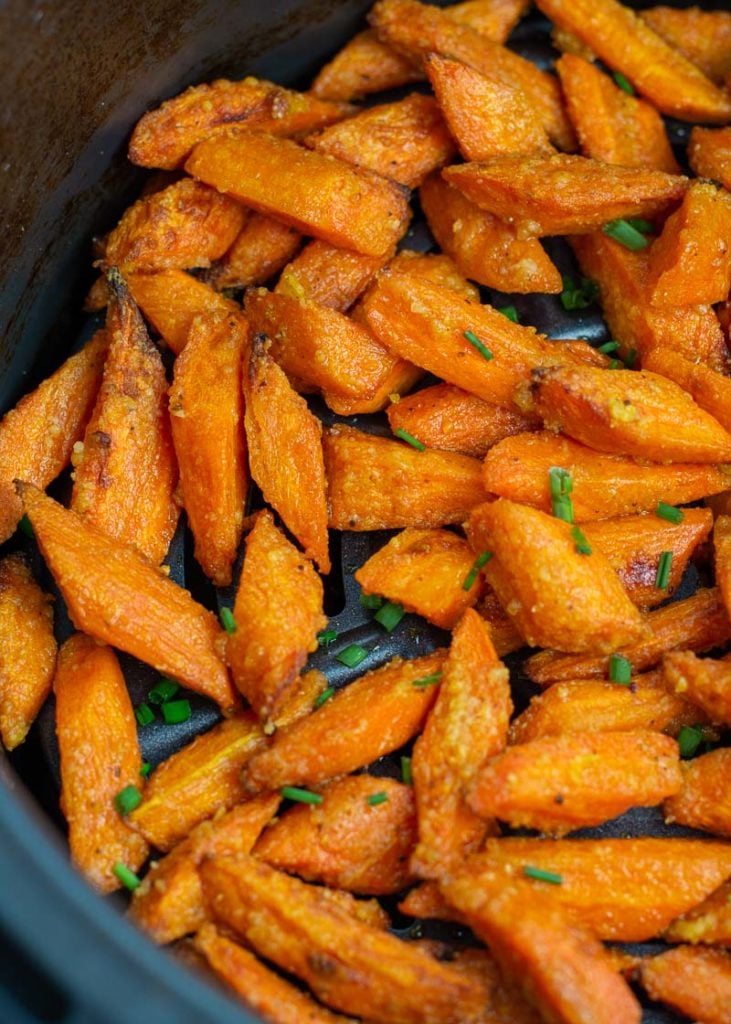 These Air Fryer Carrots are tossed in olive oil, parmesan and spices! These roasted carrots are perfectly tender on the inside and crisp on the outside.