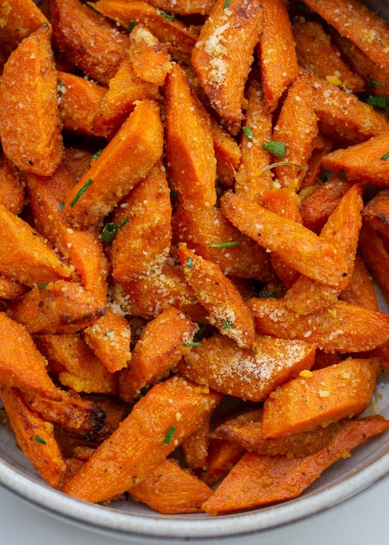 These Air Fryer Carrots are tossed in olive oil, parmesan and spices! These roasted carrots are perfectly tender on the inside and crisp on the outside.