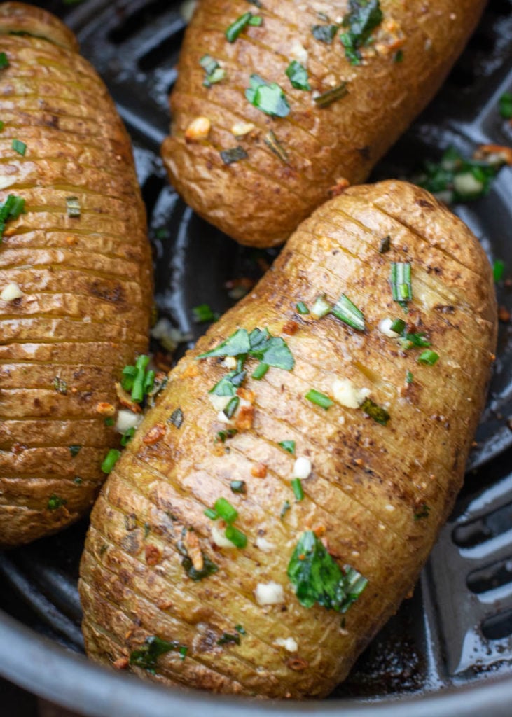 These Air Fryer Hasselback Potatoes are going to become your go-to side dish! This easy potato recipe is ready in only 15 minutes and is packed with fresh herb flavor!