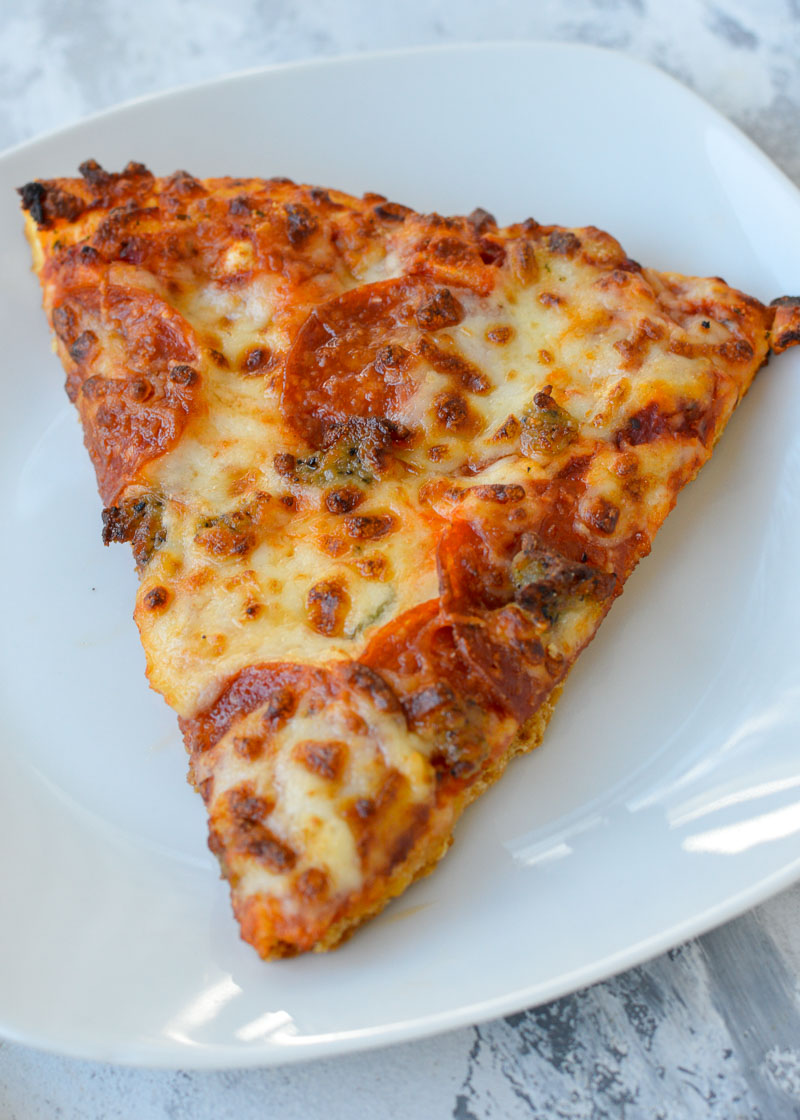 Learn how to reheat pizza in the air fryer for the BEST leftovers! Enjoy a perfectly crisp crust and gooey cheese with these reheating tips.