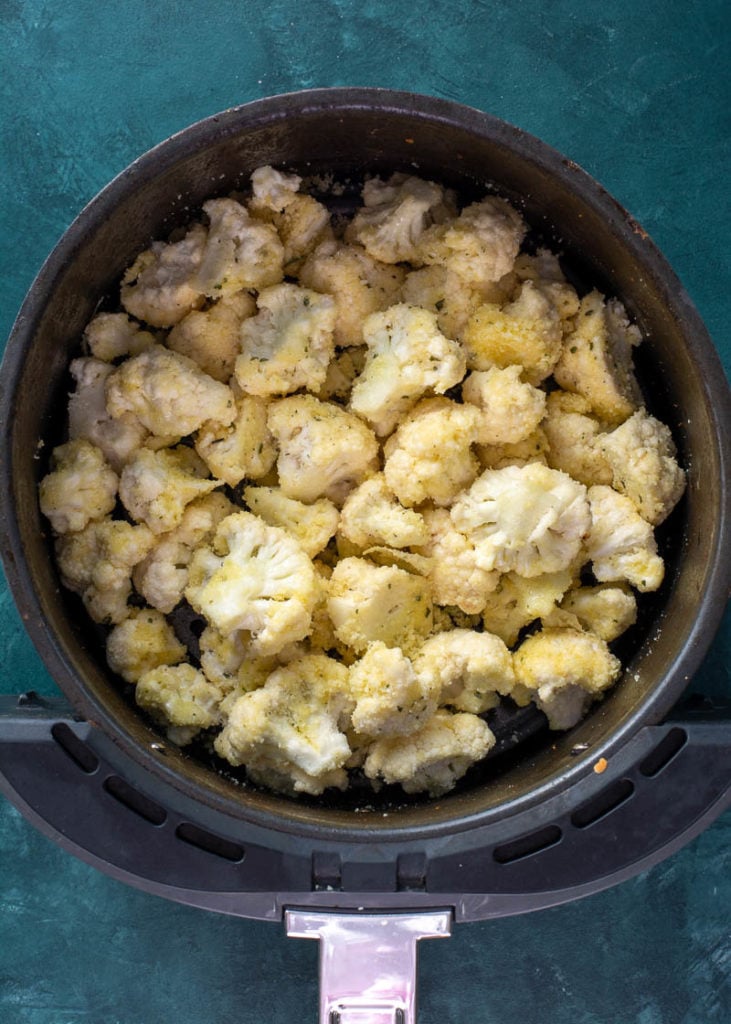 This is the Best Air Fryer Cauliflower recipe! This cauliflower is loaded with flavor and super crispy on the outside while being perfectly tender on the inside! This easy air fryer vegetable recipe is ready in less than 15 minutes! 