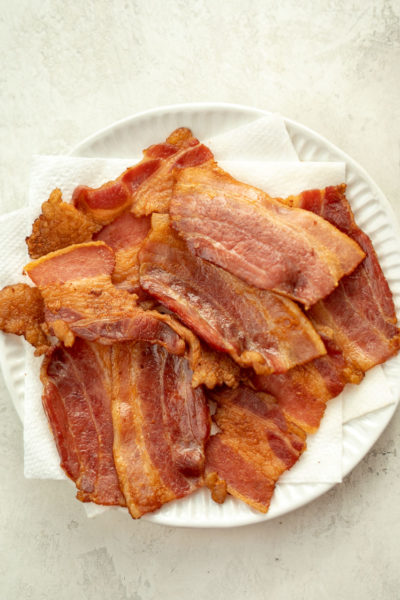 This easy Air Fryer Bacon is quick and prevents splatters in the kitchen! Perfect addition to breakfast, wraps, salads, and more!