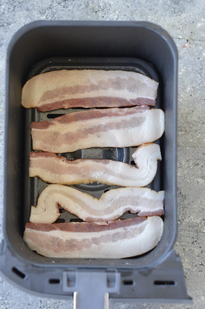 This easy Air Fryer Bacon is quick and prevents splatters in the kitchen! Perfect addition to breakfast, wraps, salads, and more!