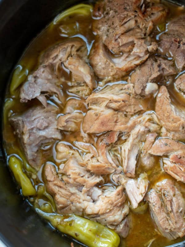 Learn exactly how to cook the perfect juicy, tender Pork Sirloin Roast! This easy pork recipe works in a dutch oven, Instant Pot or slow cooker!