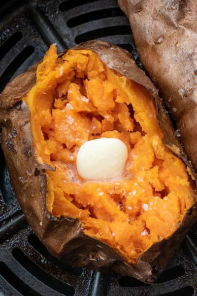 These easy Air Fryer Sweet Potatoes are perfectly soft and fluffy on the inside and crispy on the outside! You only need three ingredients to make the perfect Baked Sweet Potatoes!