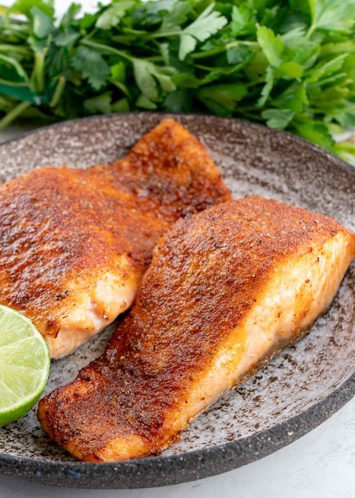 This delicious Air Fryer Salmon is ready in about 10 minutes! Learn how to cook salmon in the air fryer for the perfect healthy, quick dinner.